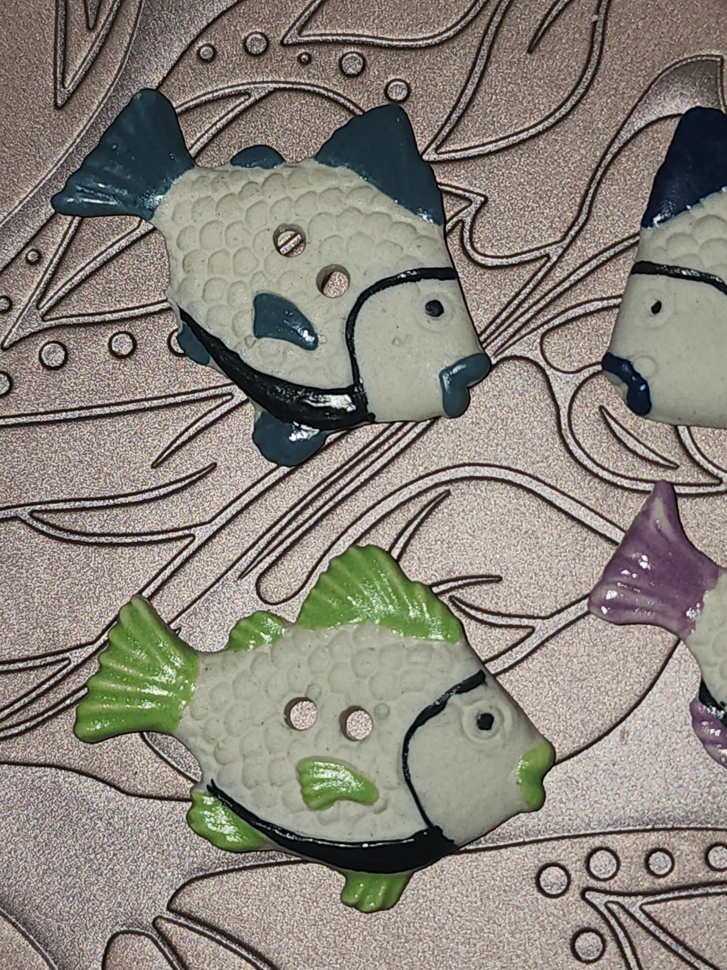 Ceramic fish buttons 40mm long