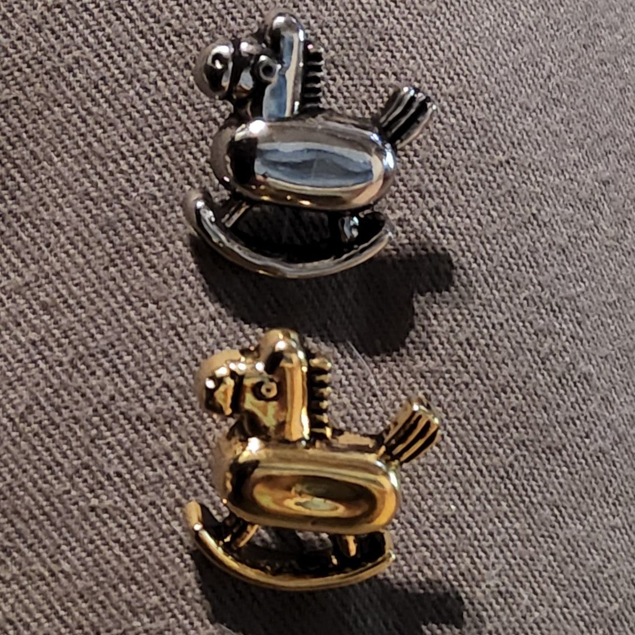 Gold and silver rocking horse buttons 18mm high