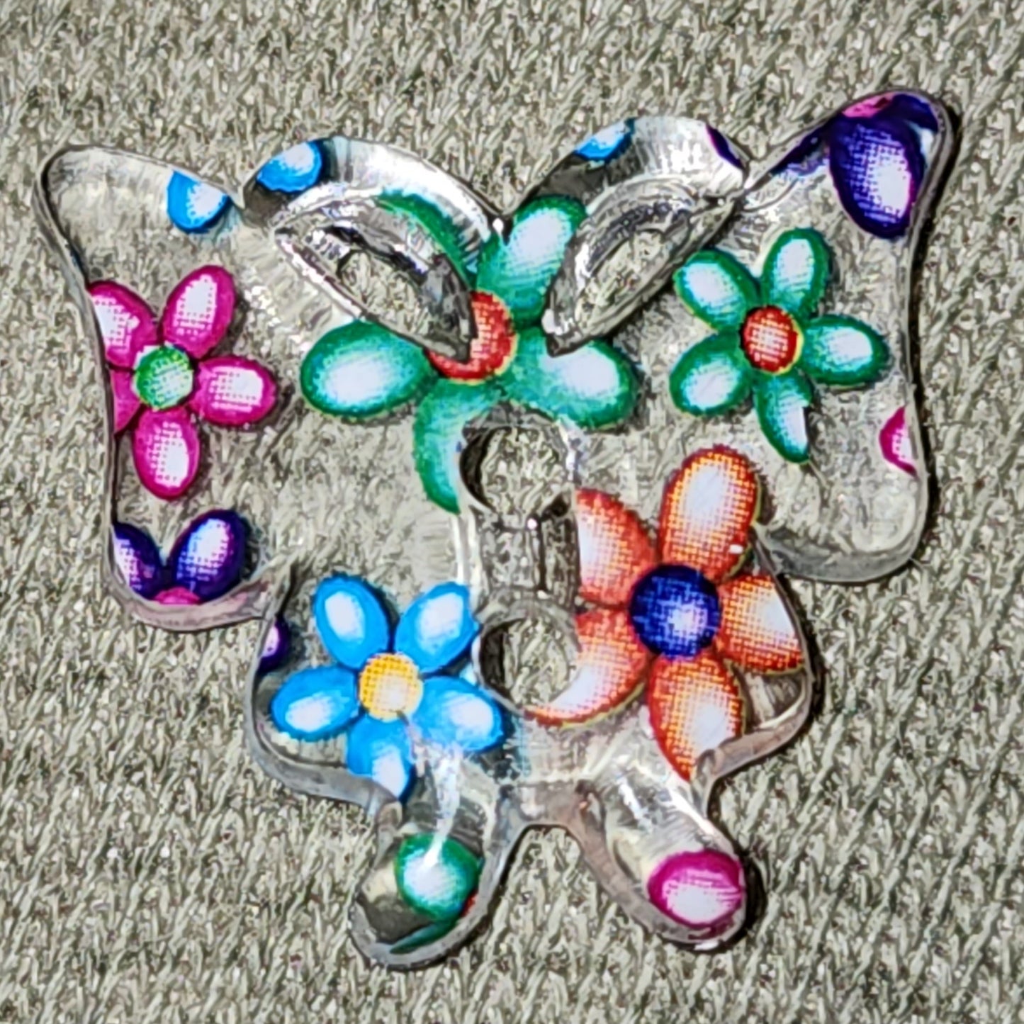 Clear floral butterfly button 20mm wide