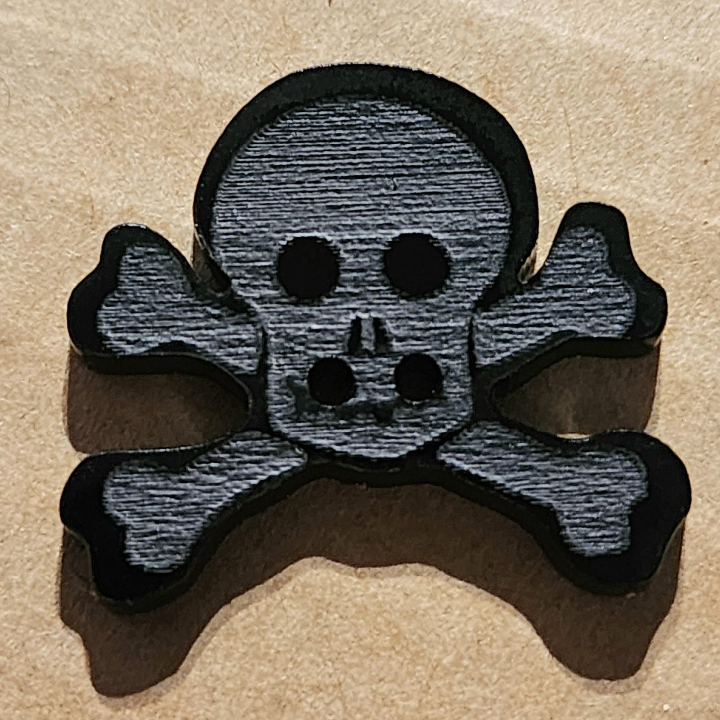 Skull crossbones button 25mm wide