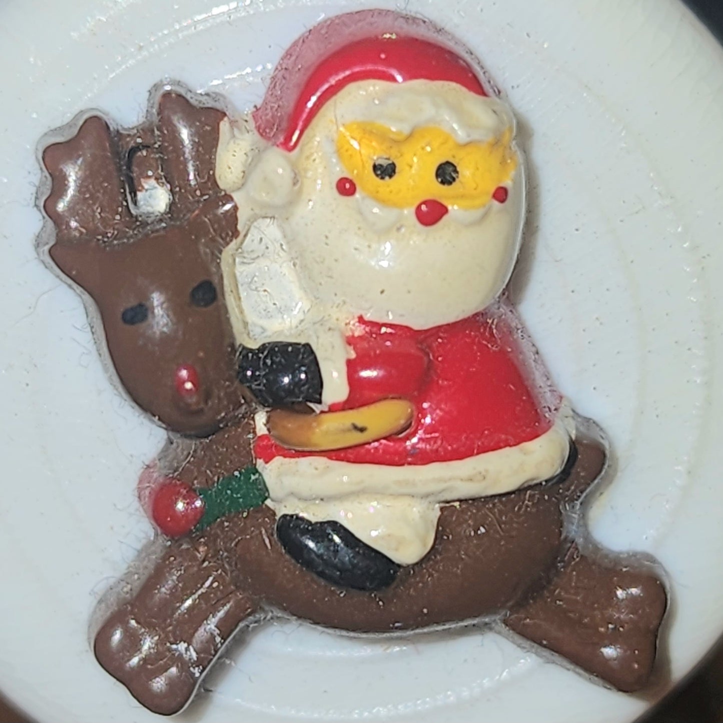 Santa riding Reindeer button 20mm