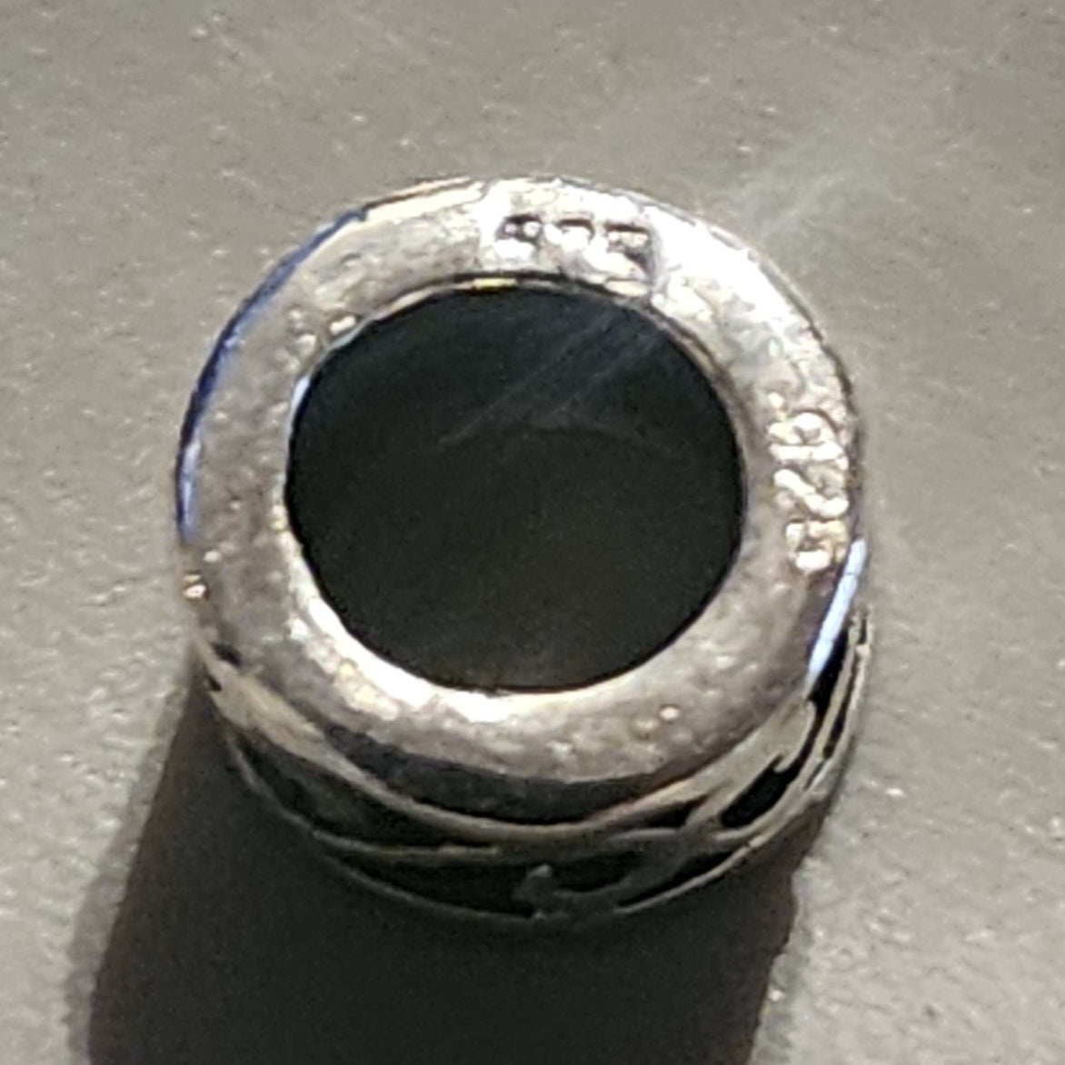 Sterling silver round scroll bead