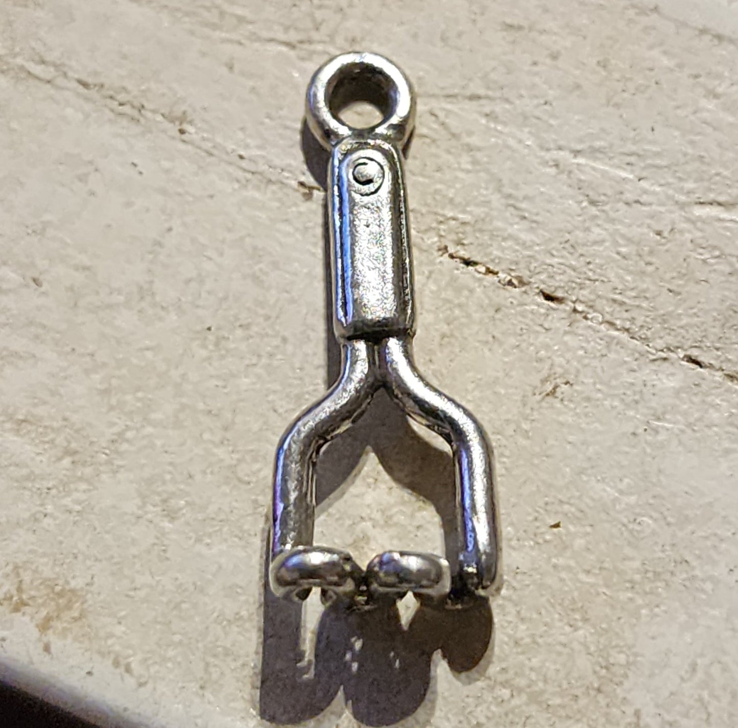 Metal potato masher charm
