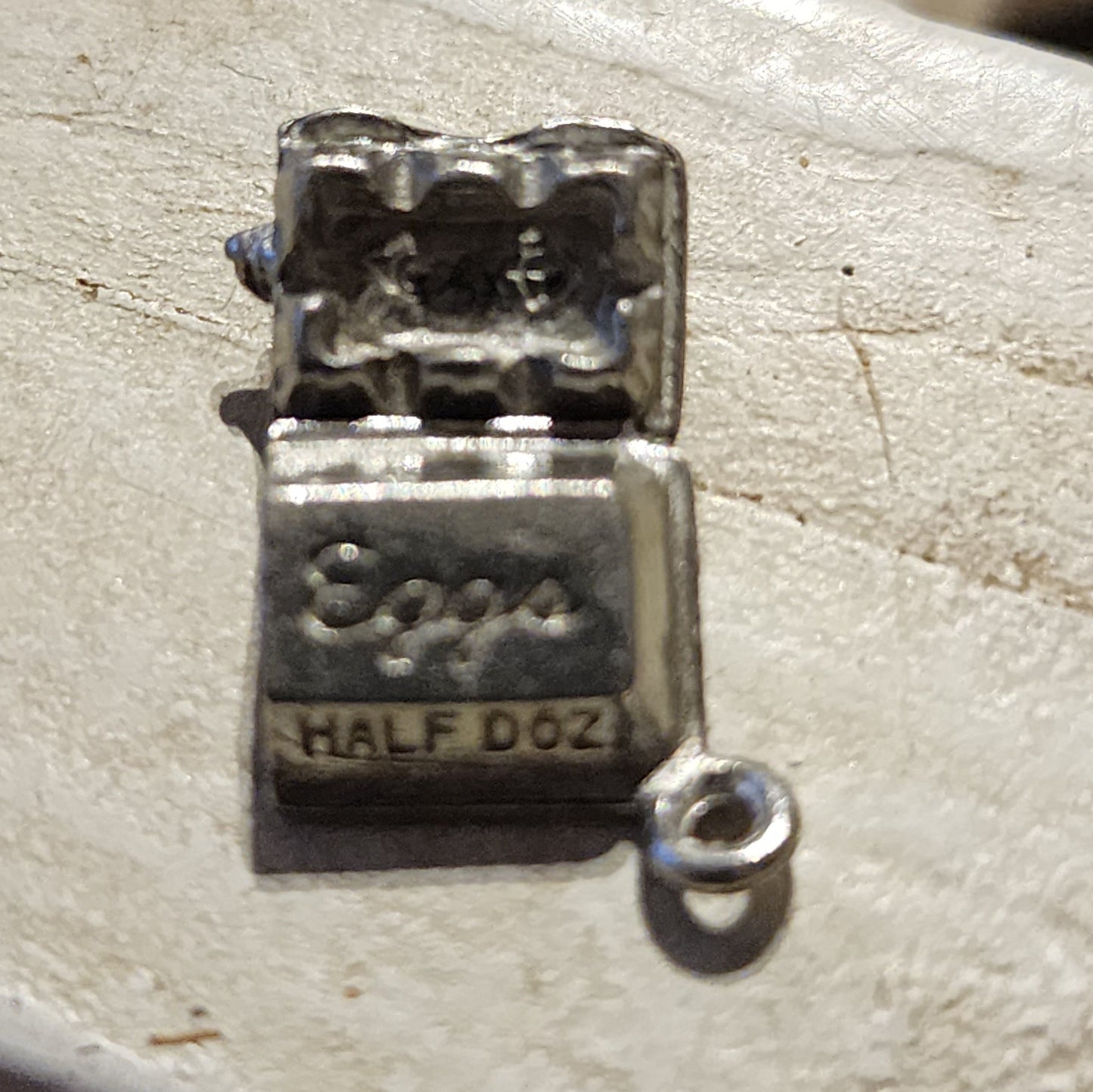 Metal egg carton charm