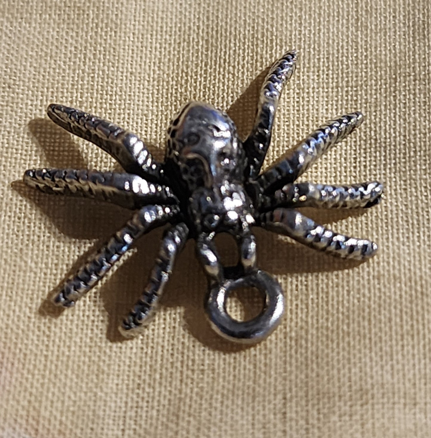 Metal spider charm