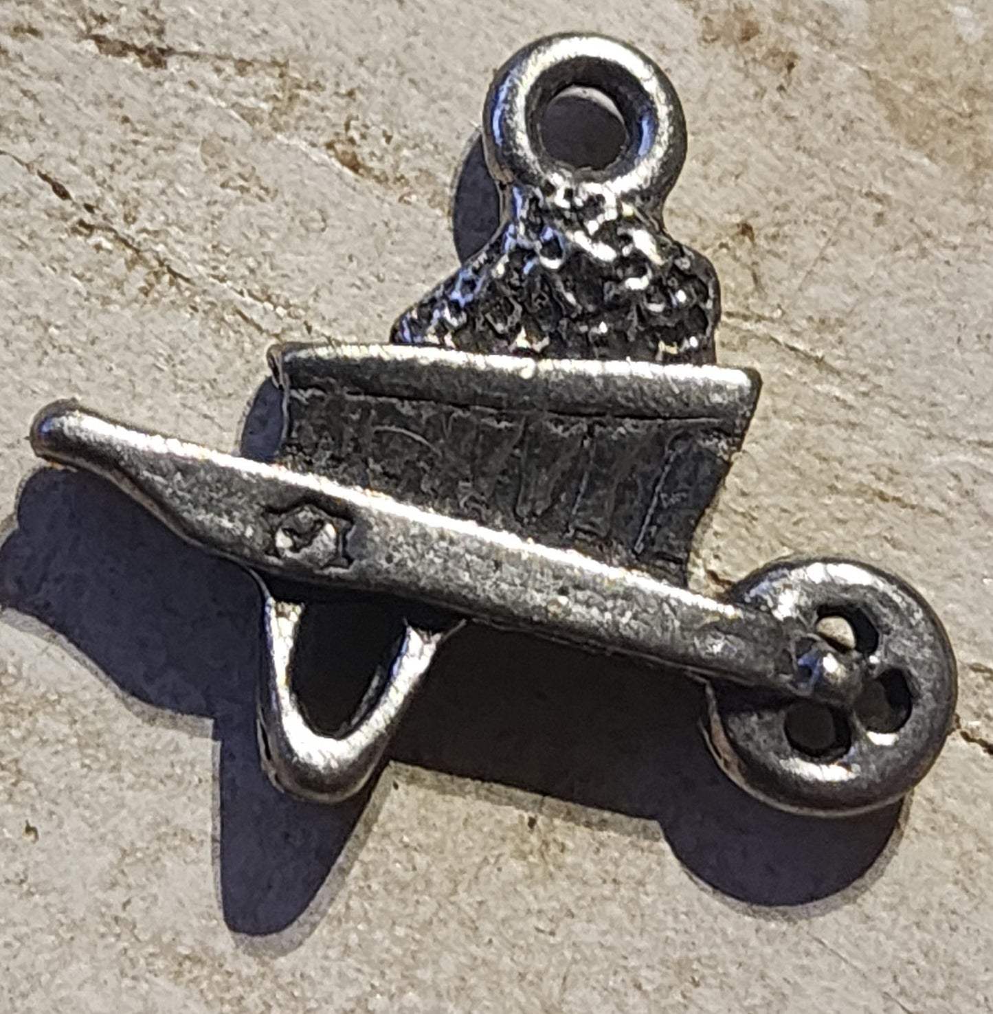 Metal wheelbarrow charm