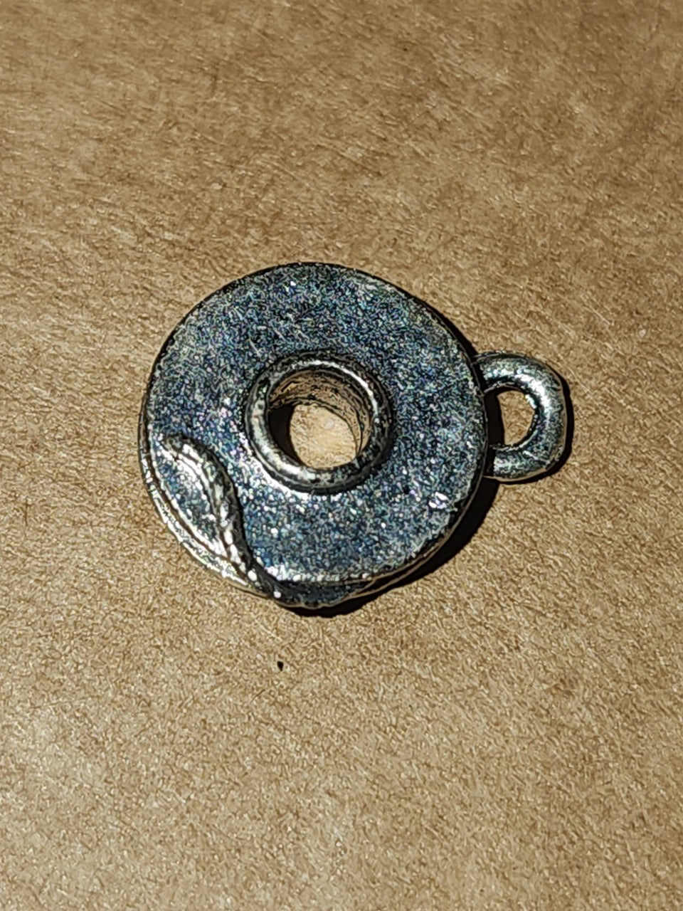Metal bobbin charm