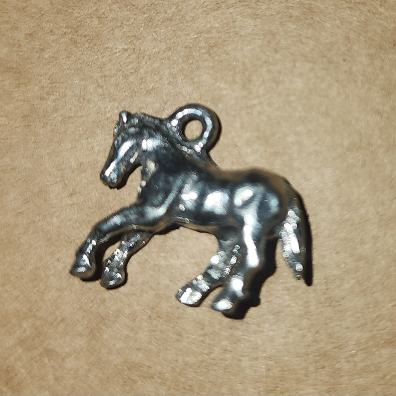 Metal horse charm