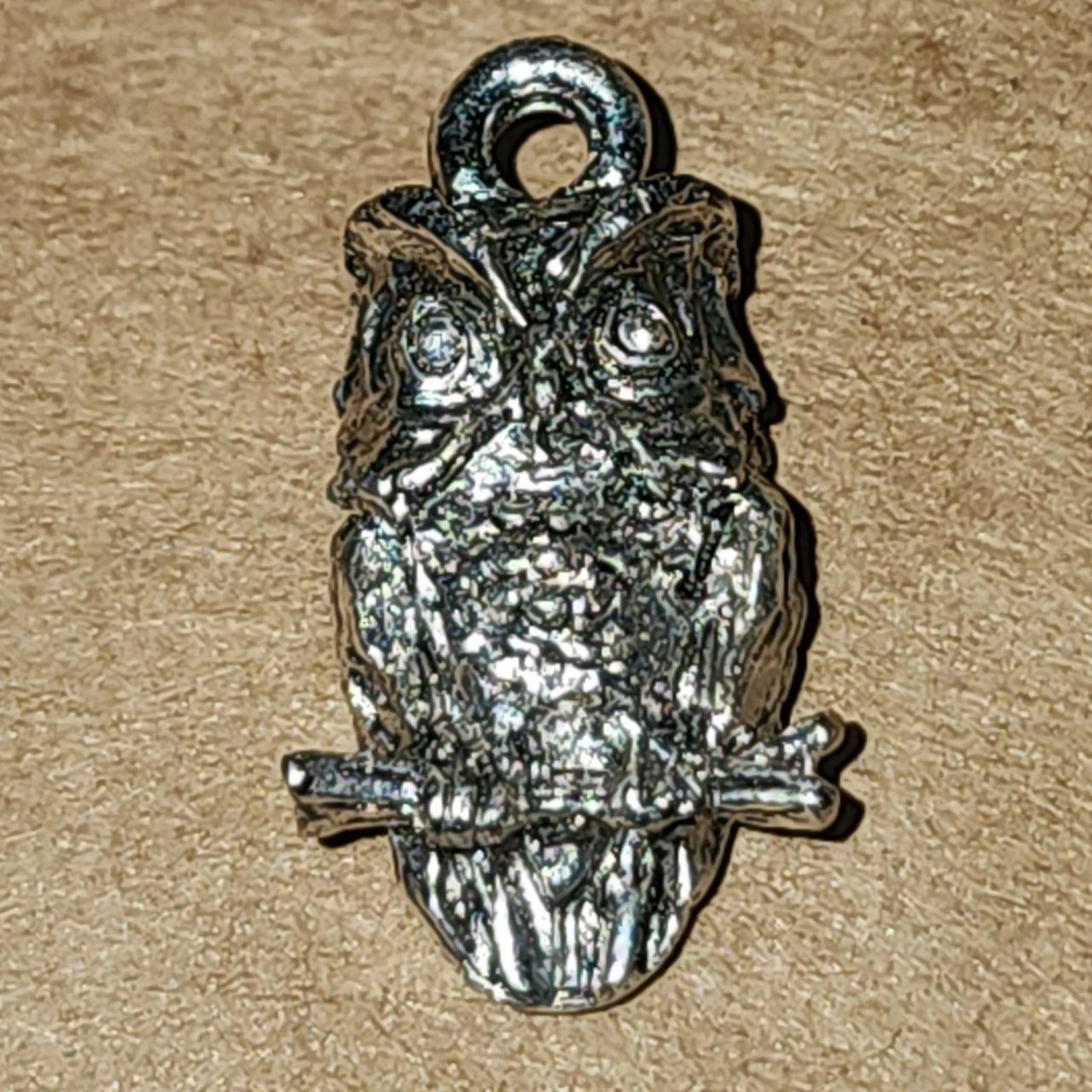 Metal owl charm