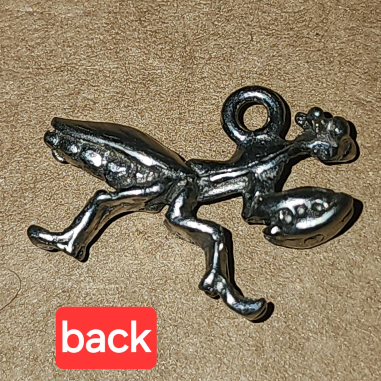 Metal praying mantis charm