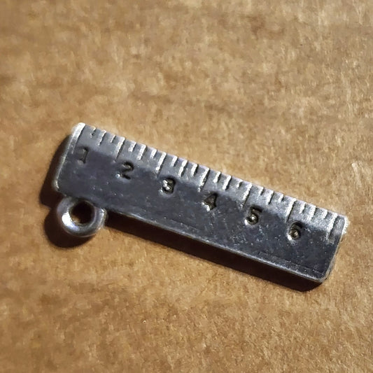 Metal ruler charm