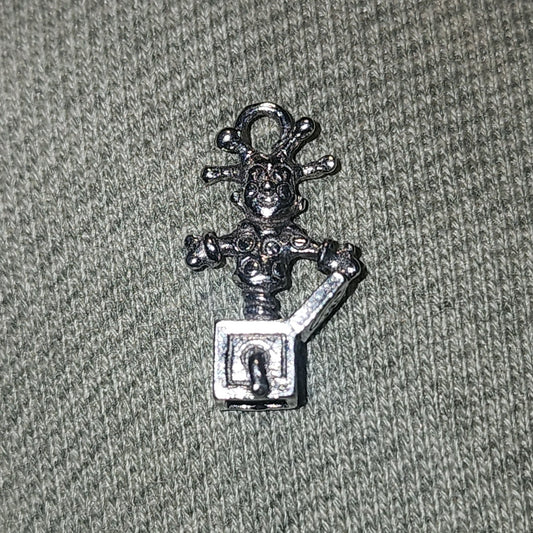 Metal jack in the box charm
