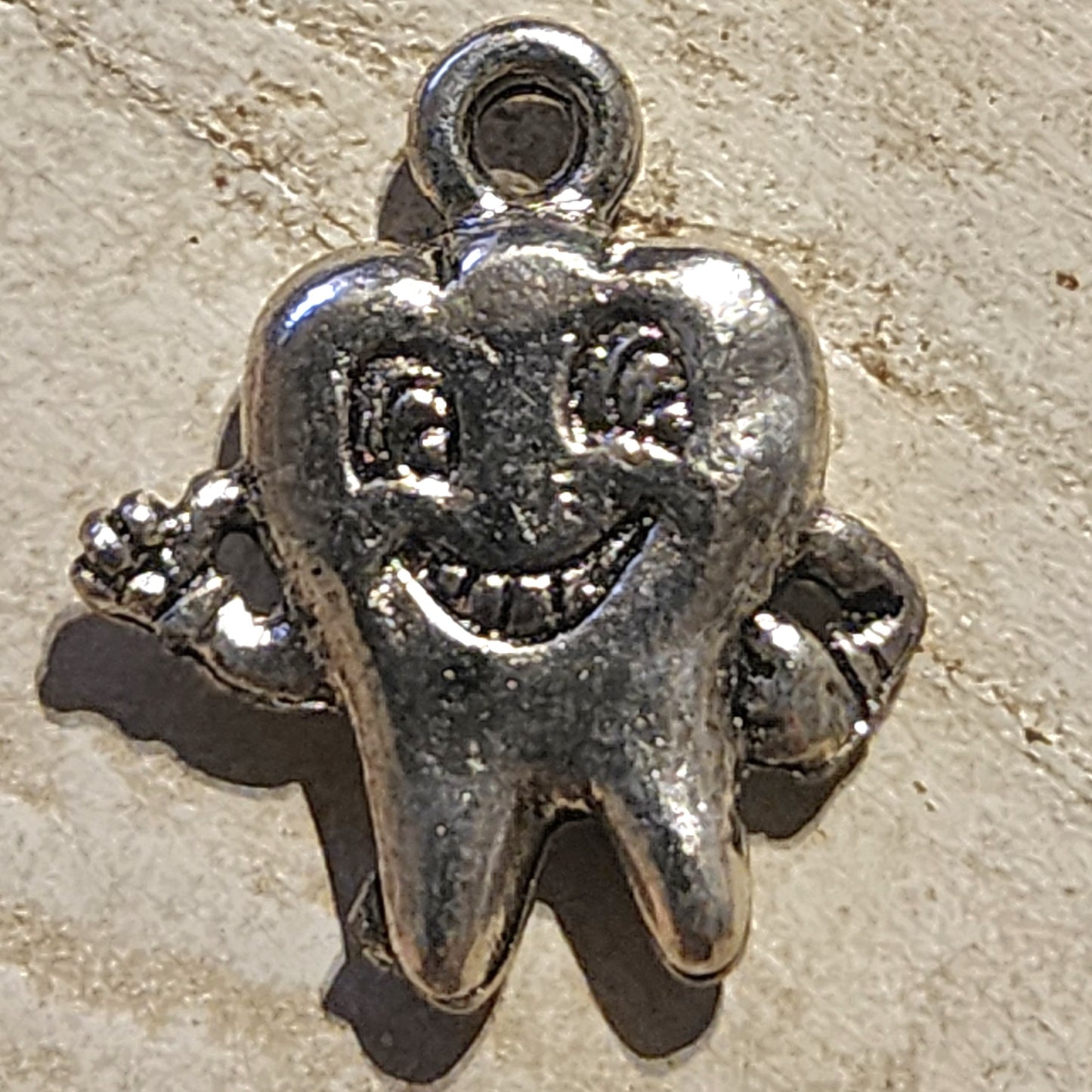 Metal tooth charm