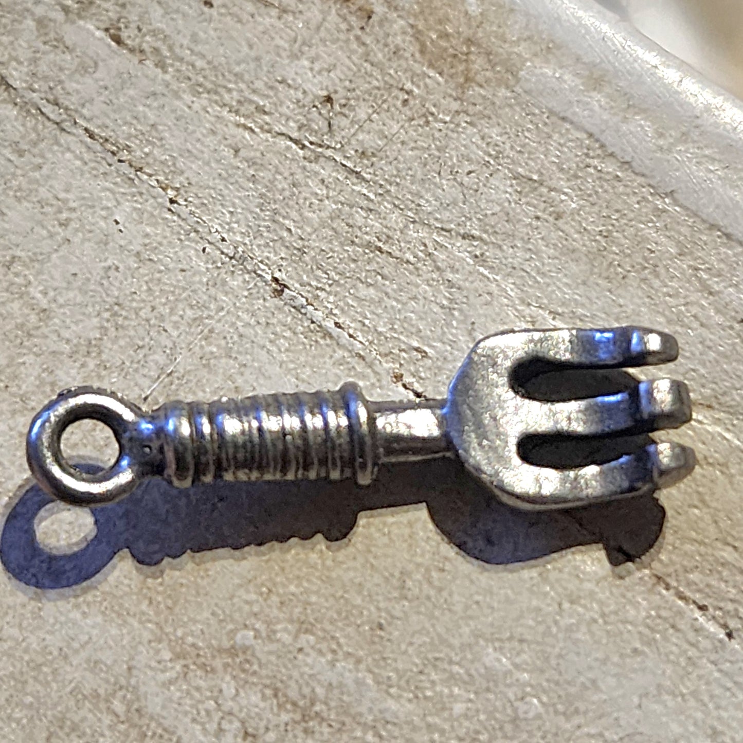 Metal garden fork charm