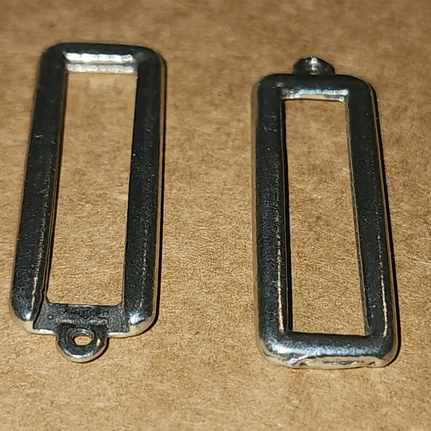 Metal frame pendant
