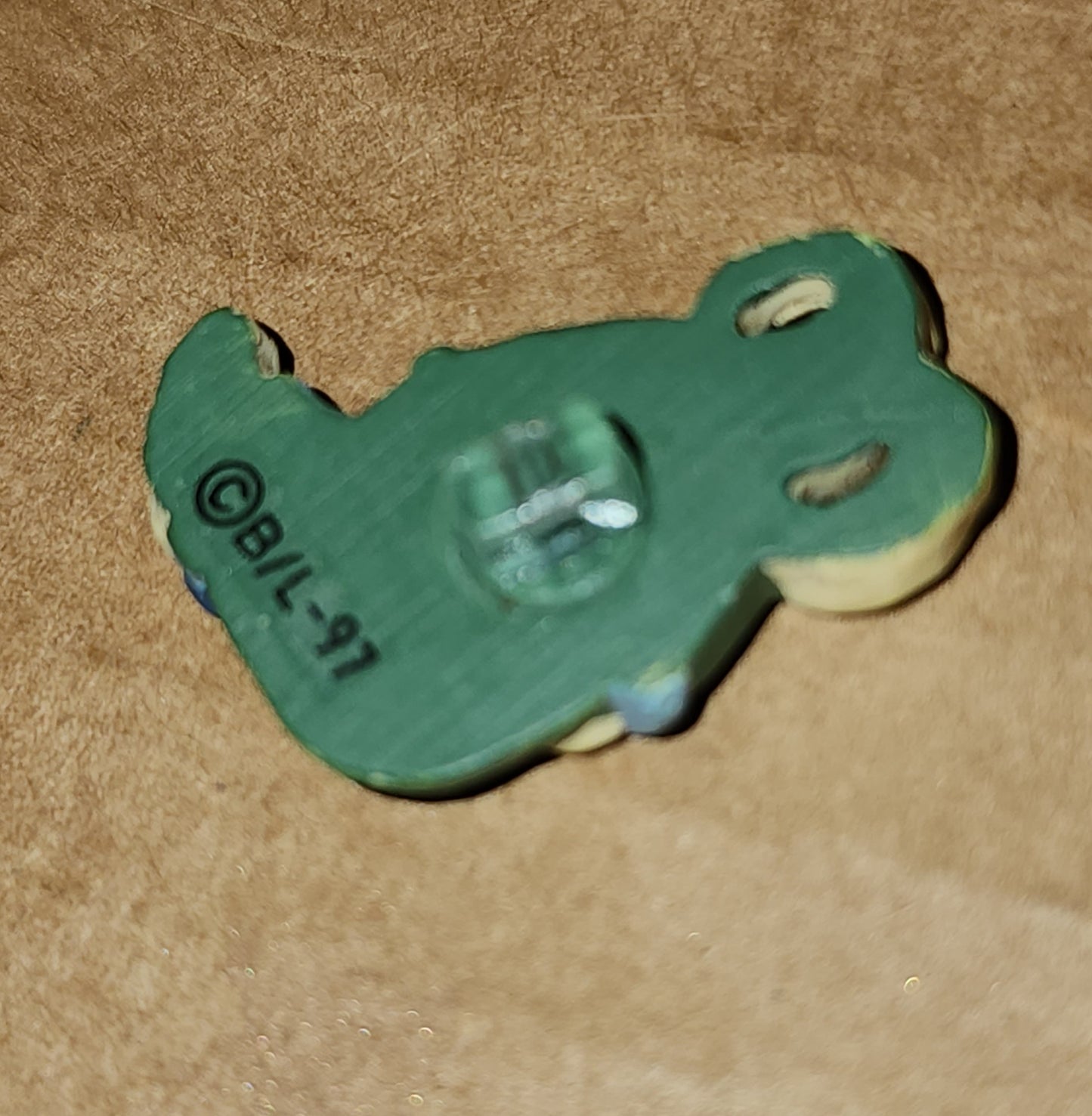 Bunny in green pyjamas button 2.5cm high