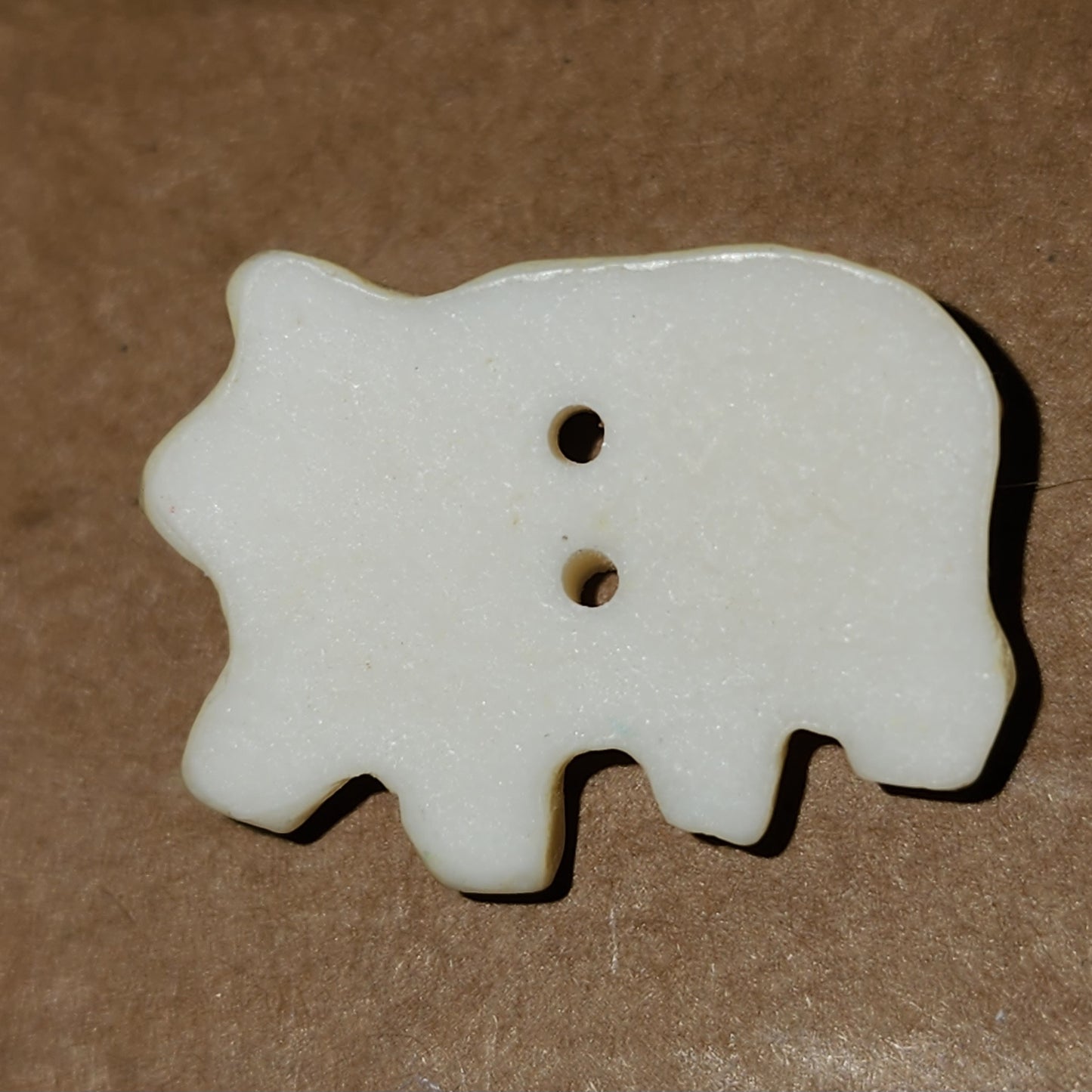 Floral pig button 2.5cm wide