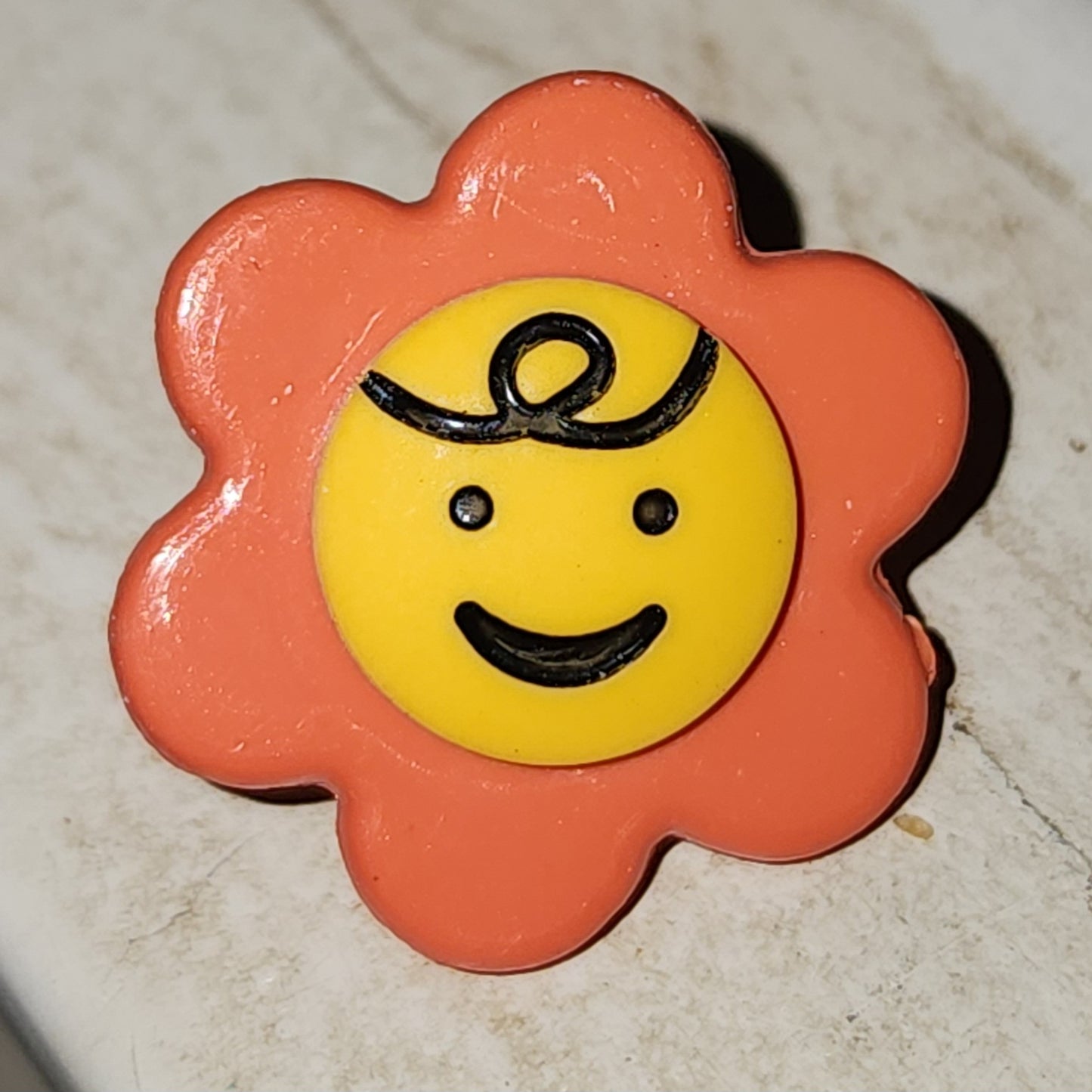 Orange smiley flower button 2cm