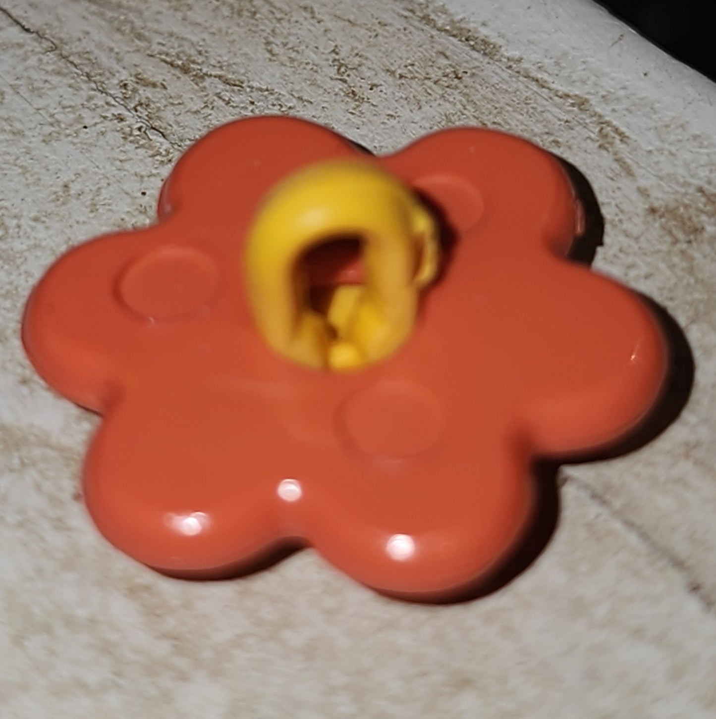 Orange smiley flower button 2cm