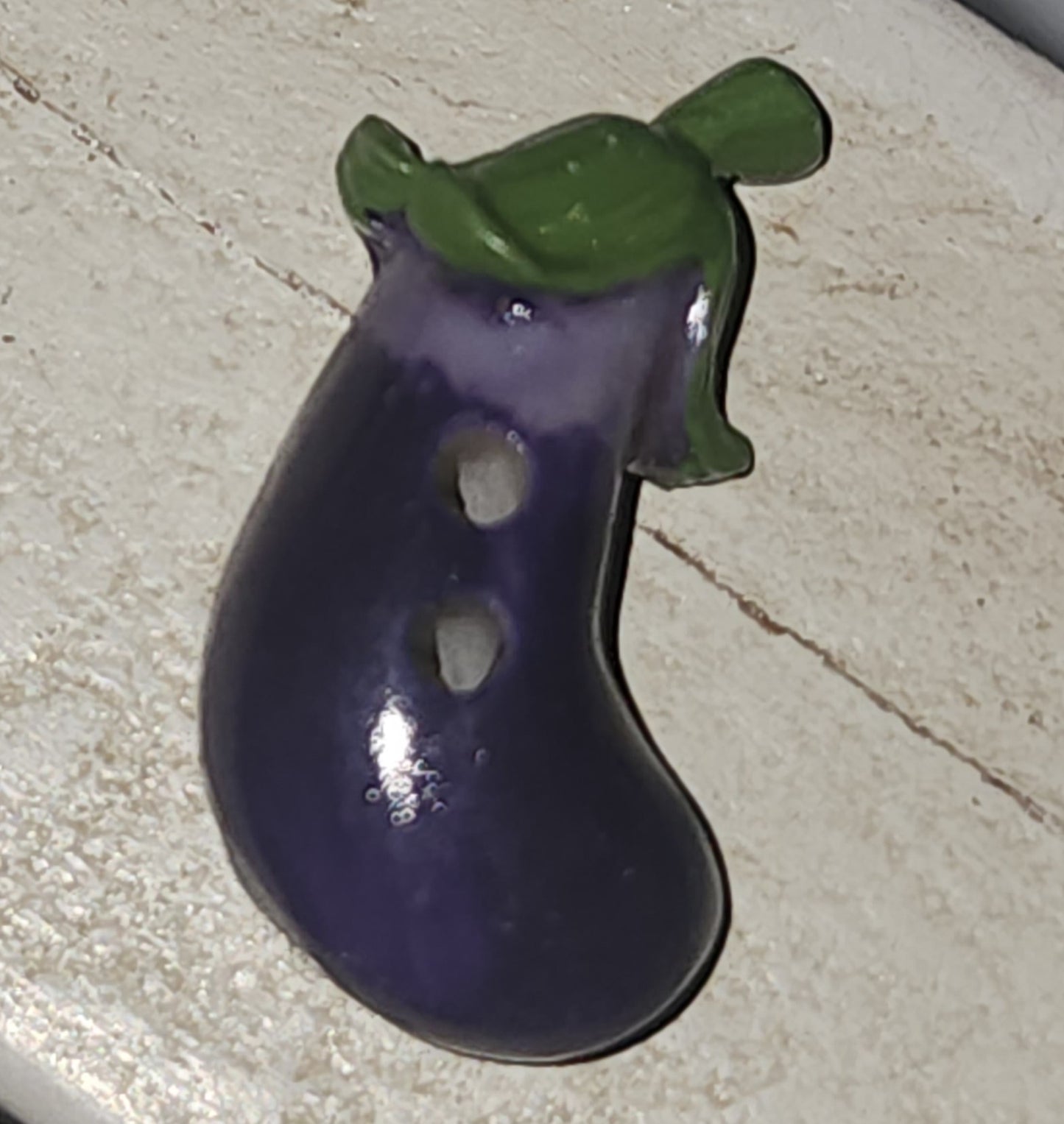 Resin eggplant button 25mm long