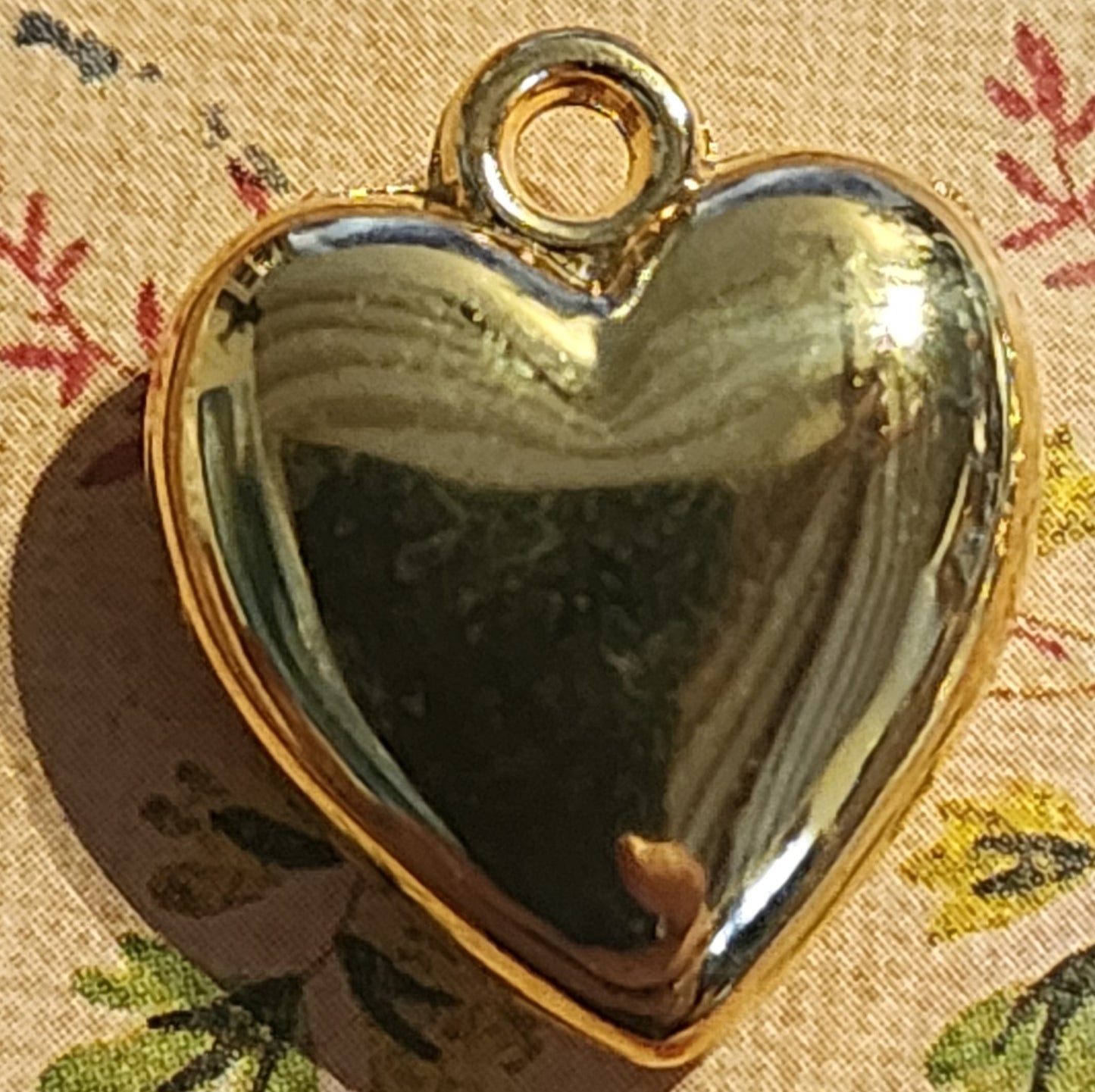 Gold heart charm 17mm high