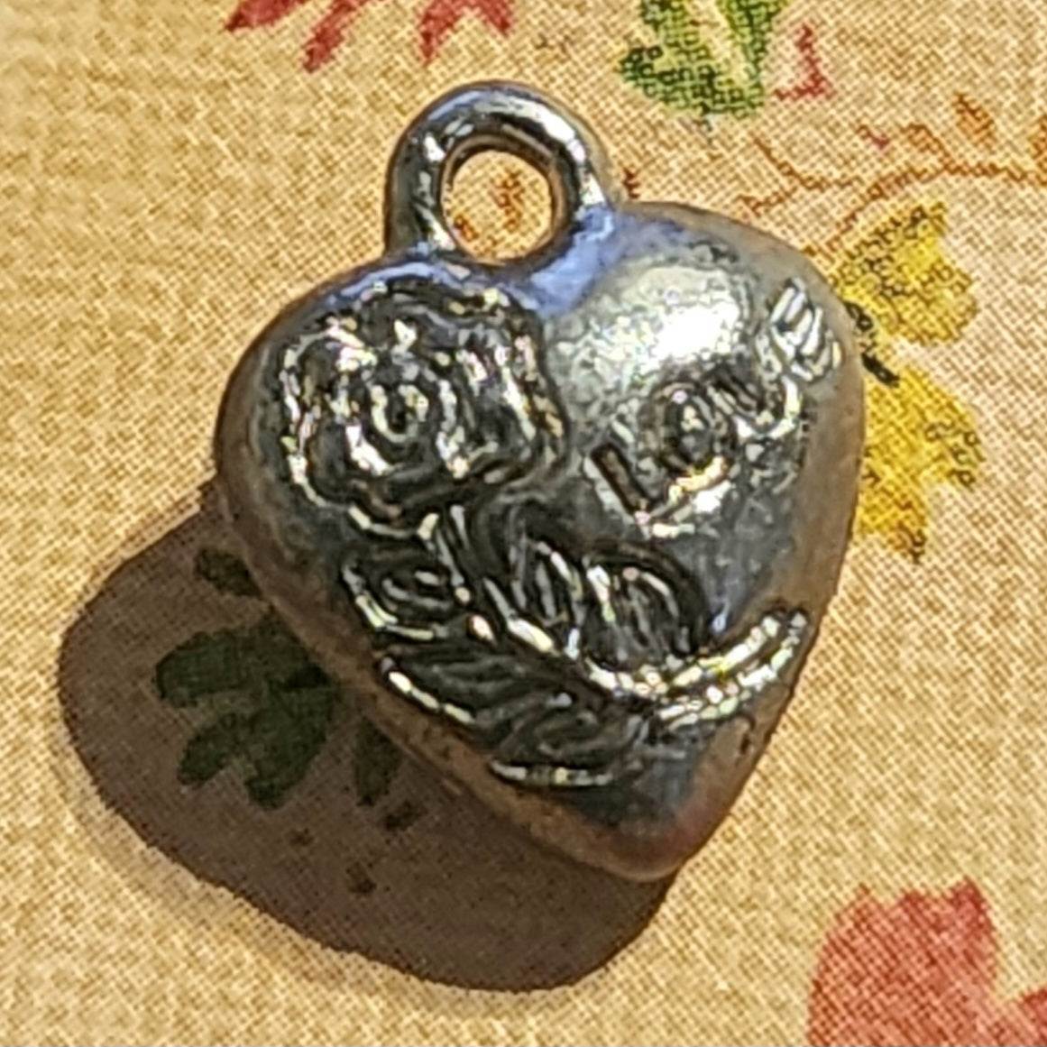 Silver heart charm with LOVE engraved 10mm