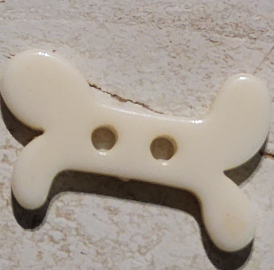 Plastic dog bone button 20mm long