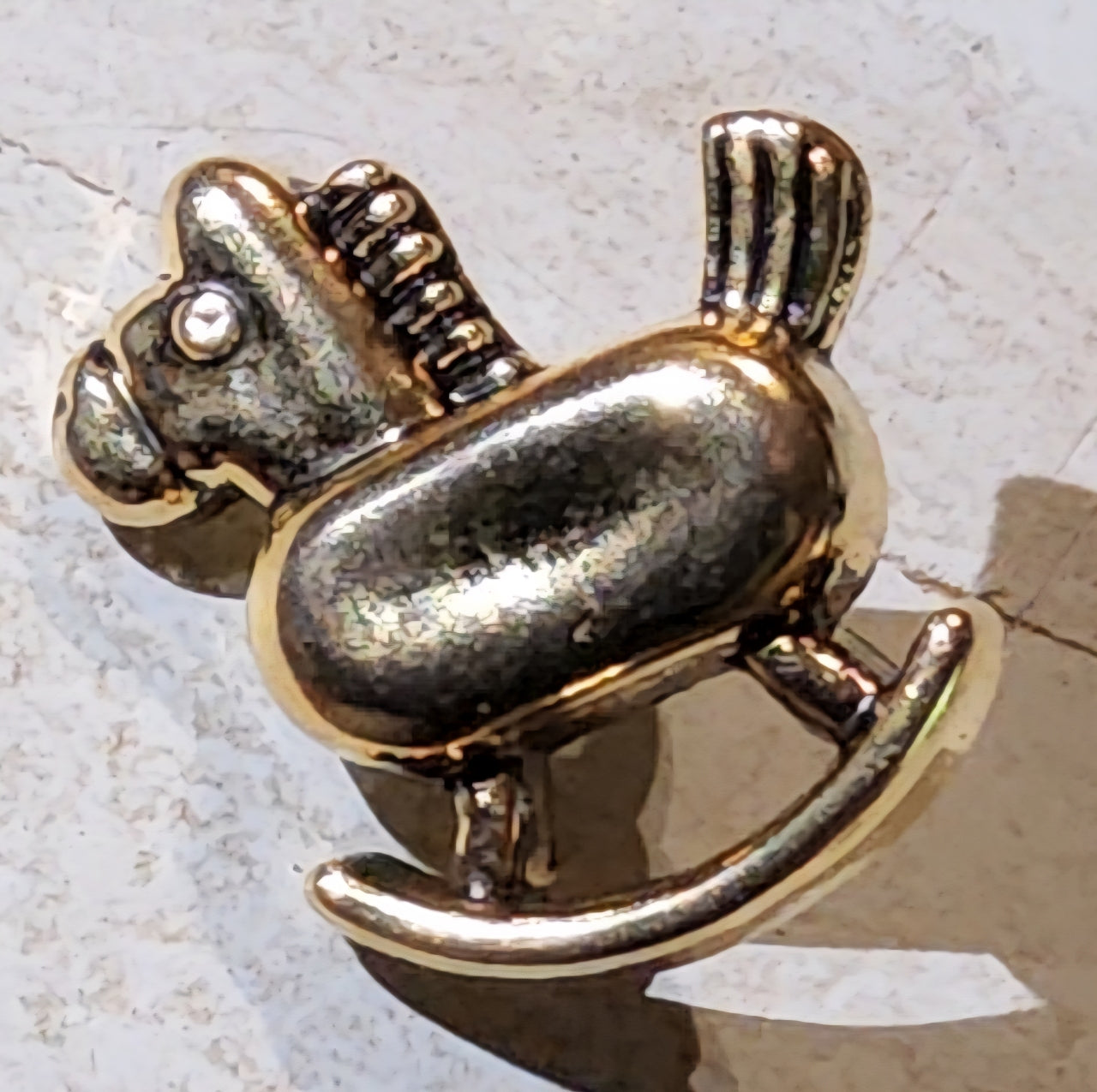 Gold and silver rocking horse buttons 18mm high