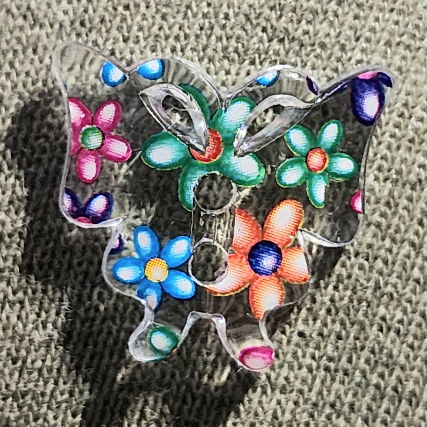 Clear floral butterfly button 20mm wide