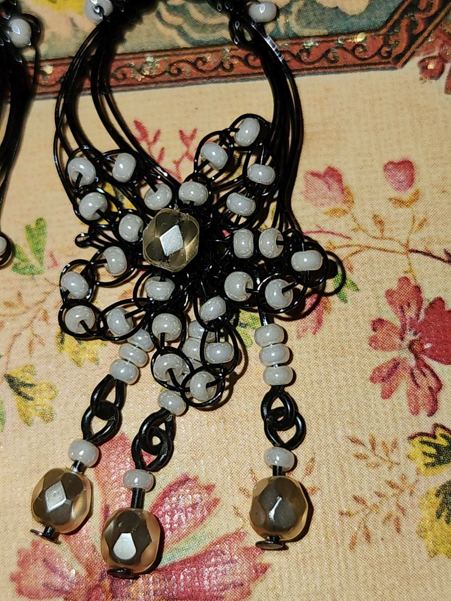 Wire beaded star earrings 55mm drop