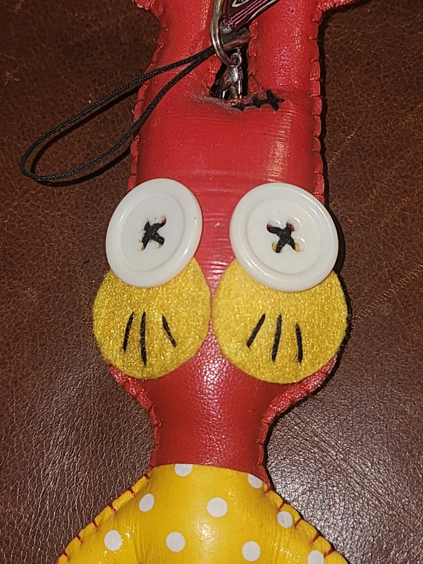 Red vinyl rabbit keyring 17cm