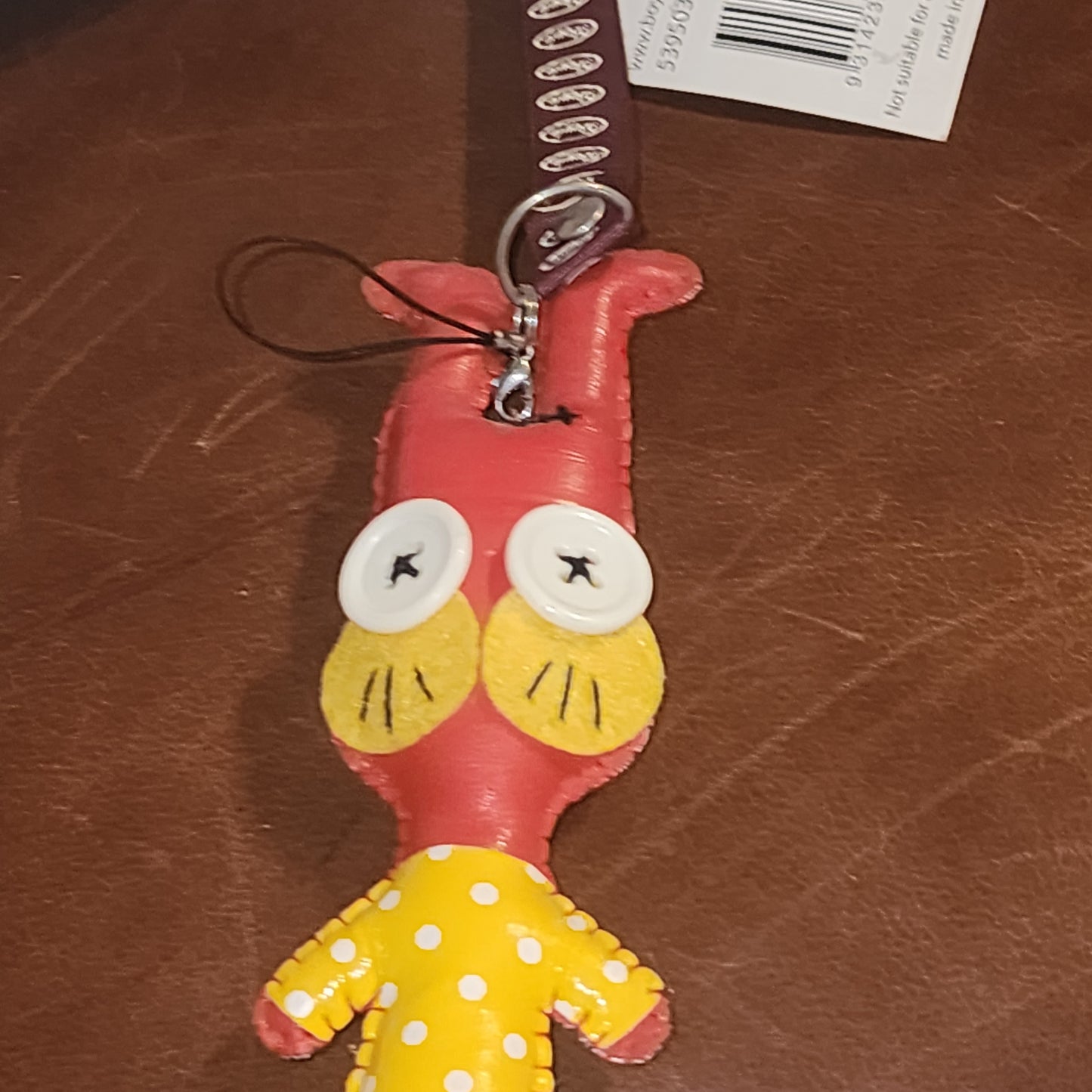 Red vinyl rabbit keyring 17cm