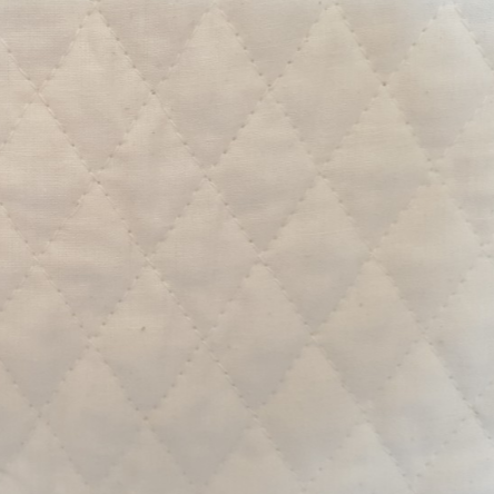 Quilted Calico Diamond Pattern in natural (112cm wide)