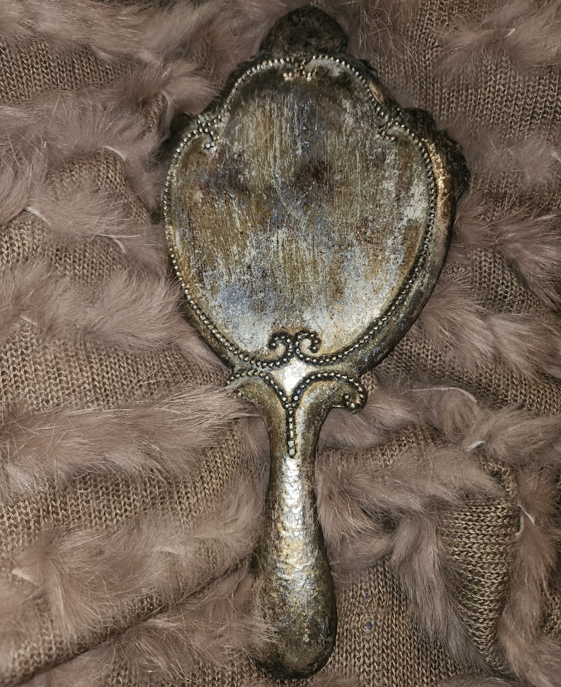 Hand-held silver decorative mirror (10 inch)