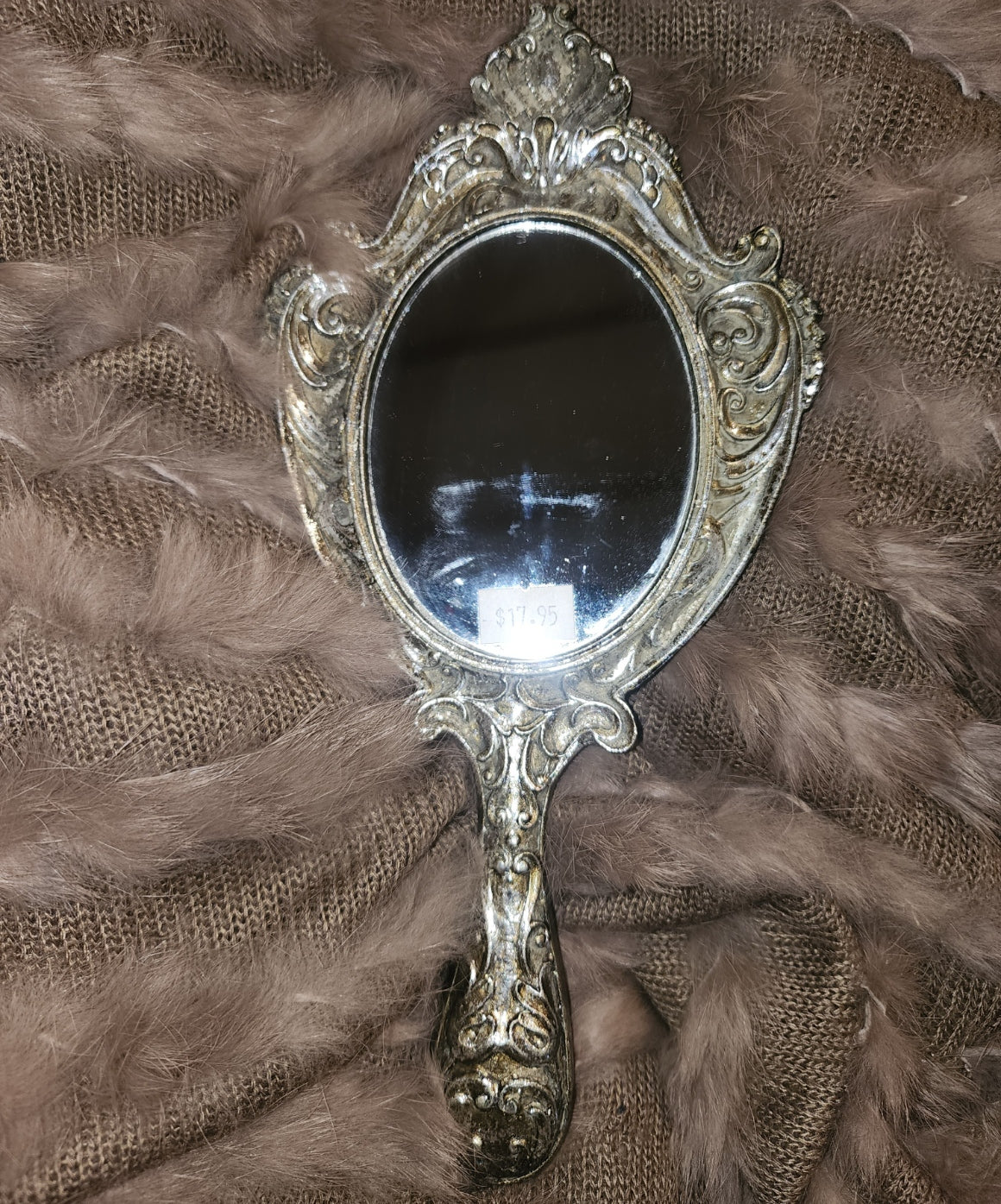 Hand-held silver decorative mirror (10 inch)