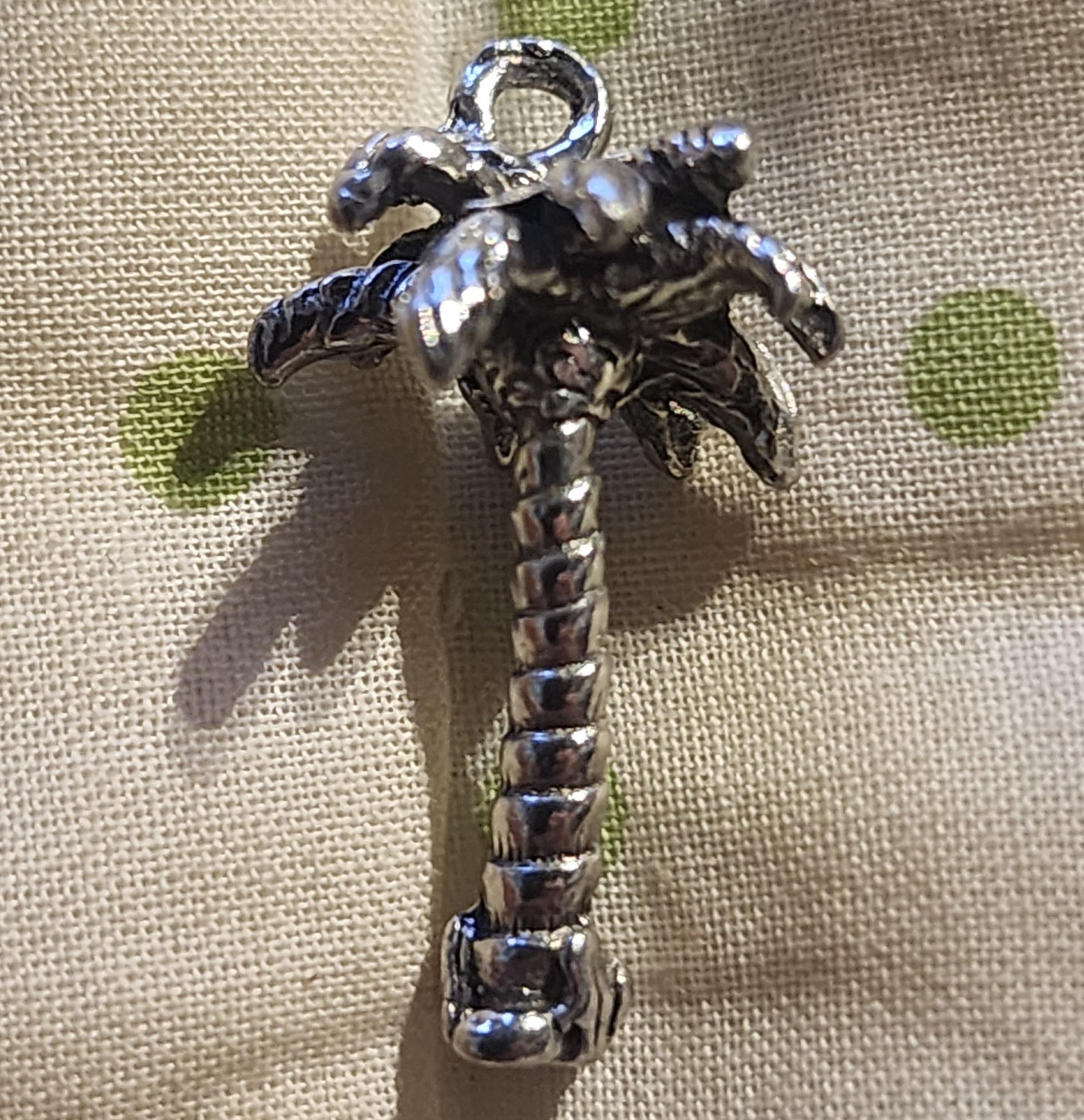 Metal palm tree charm