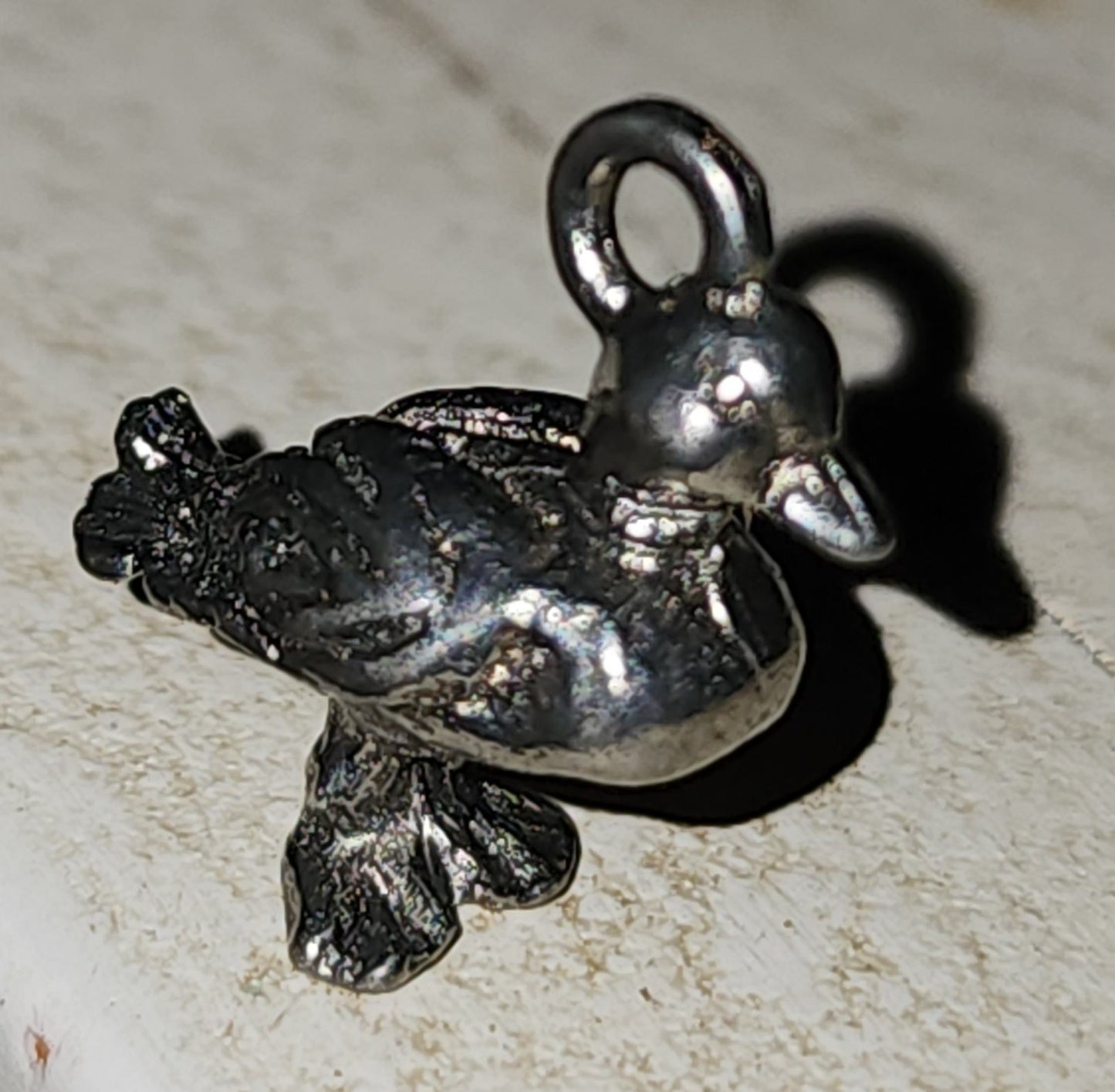 Metal duck charm