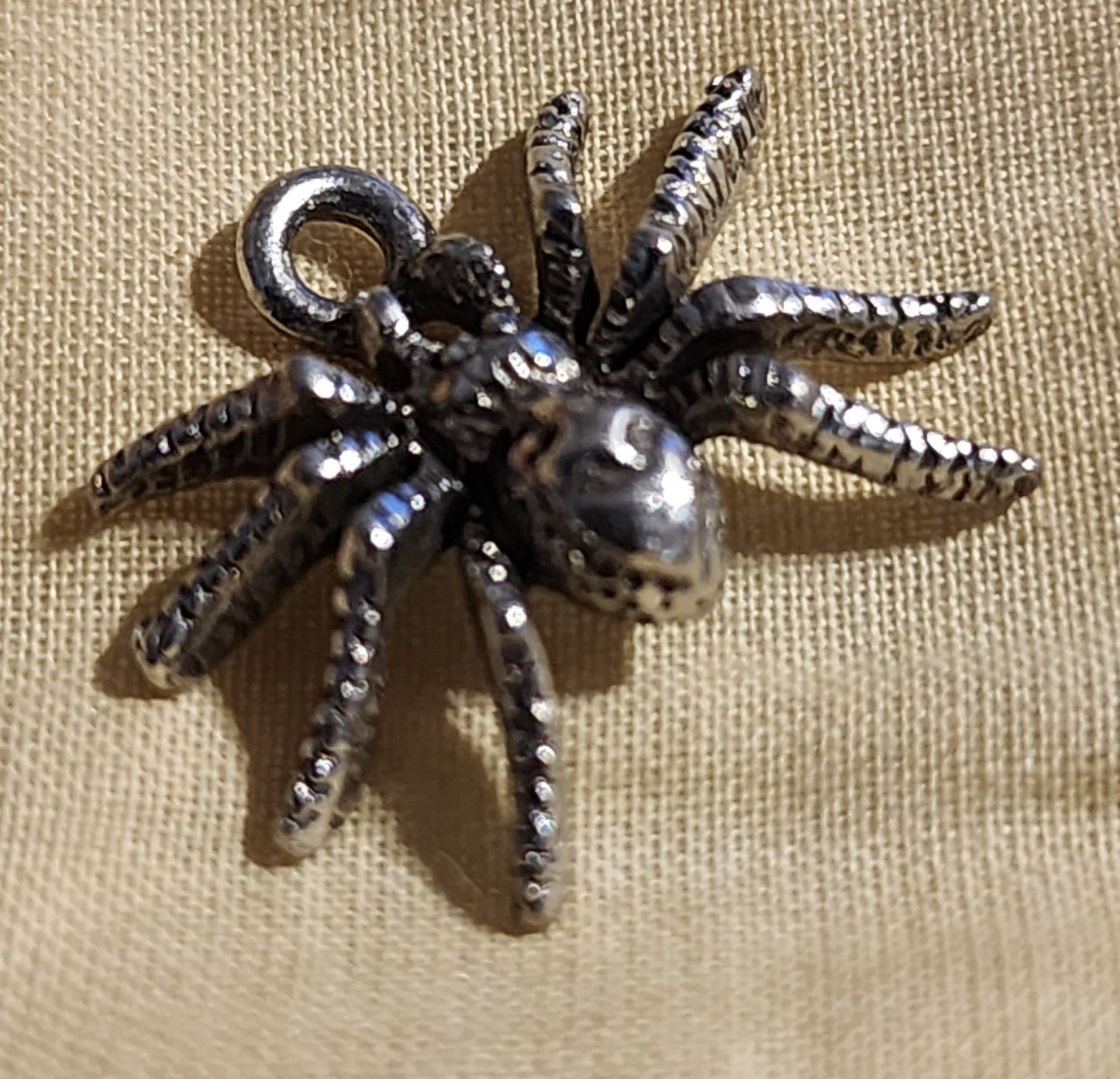 Metal spider charm
