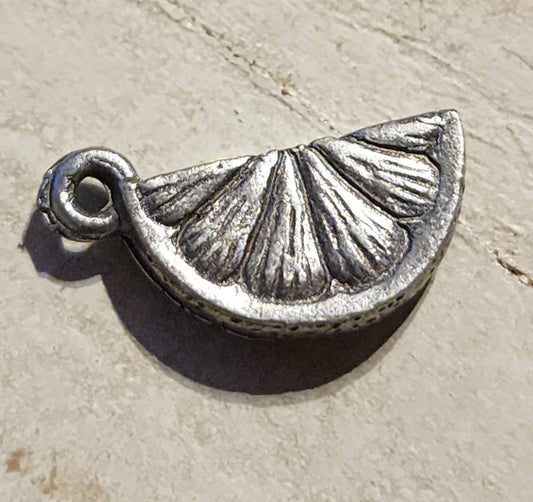 Metal lemon or orange slice charm