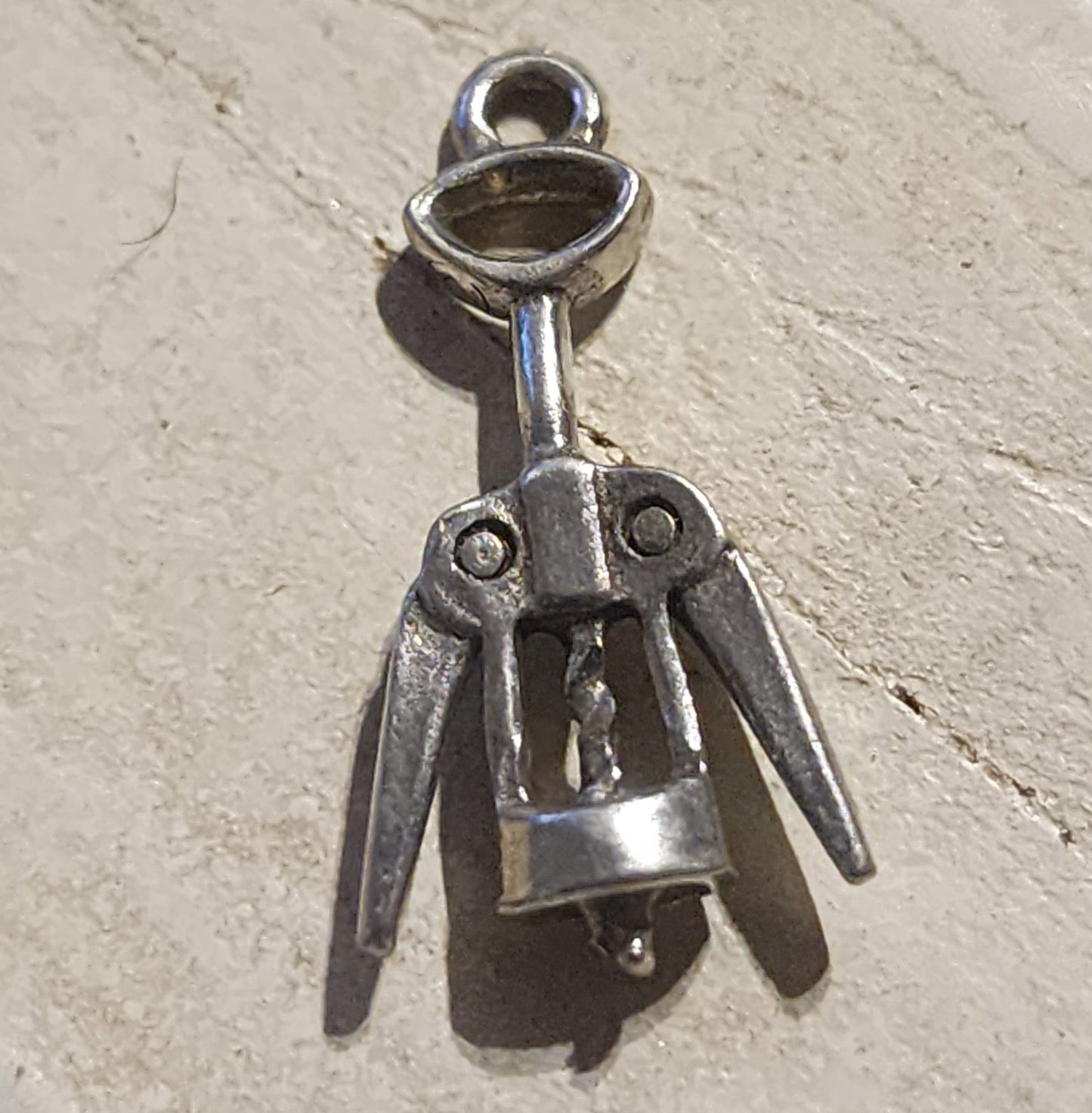 Metal corkscrew charm