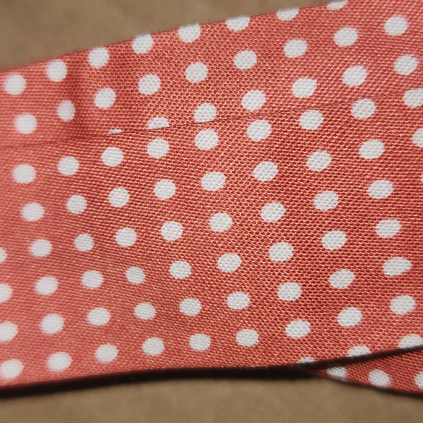 Polycotton Bias Binding 25mm orange white dot (1.5m left)