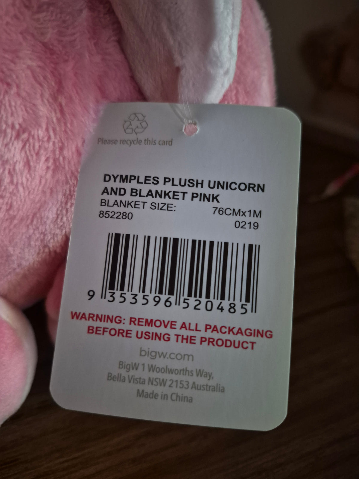 Pink plush unicorn with crib blanket
