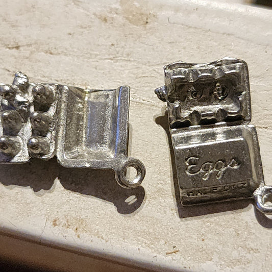 Metal egg carton charm