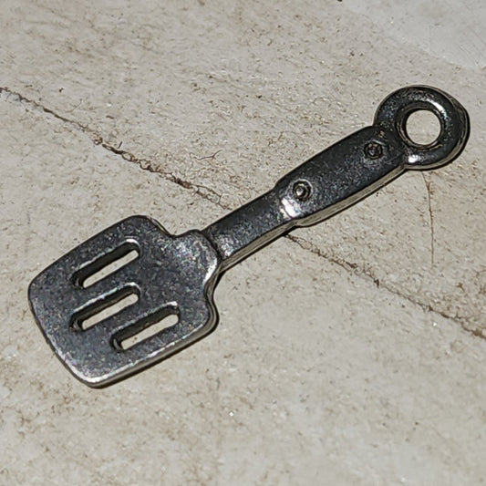 Metal spatula charm