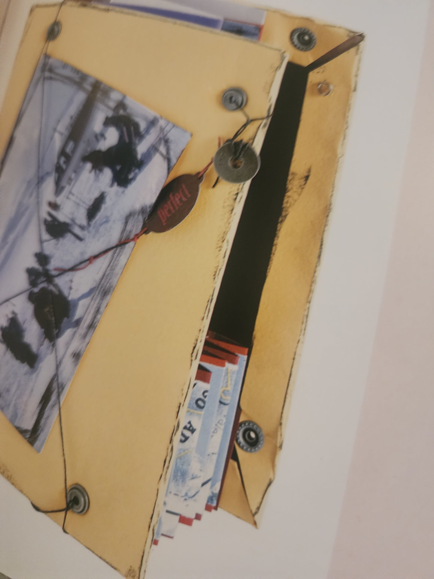 Pockets, Pull-outs, and Hiding Places.  Interactive elements for altered books, memory art and collage