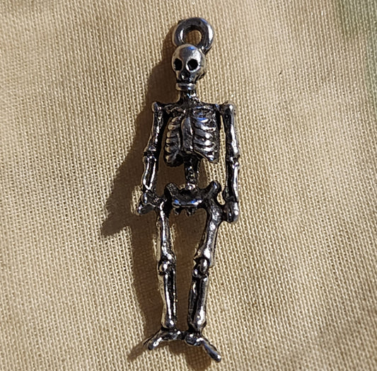 Metal skeleton charm approx 2cm high