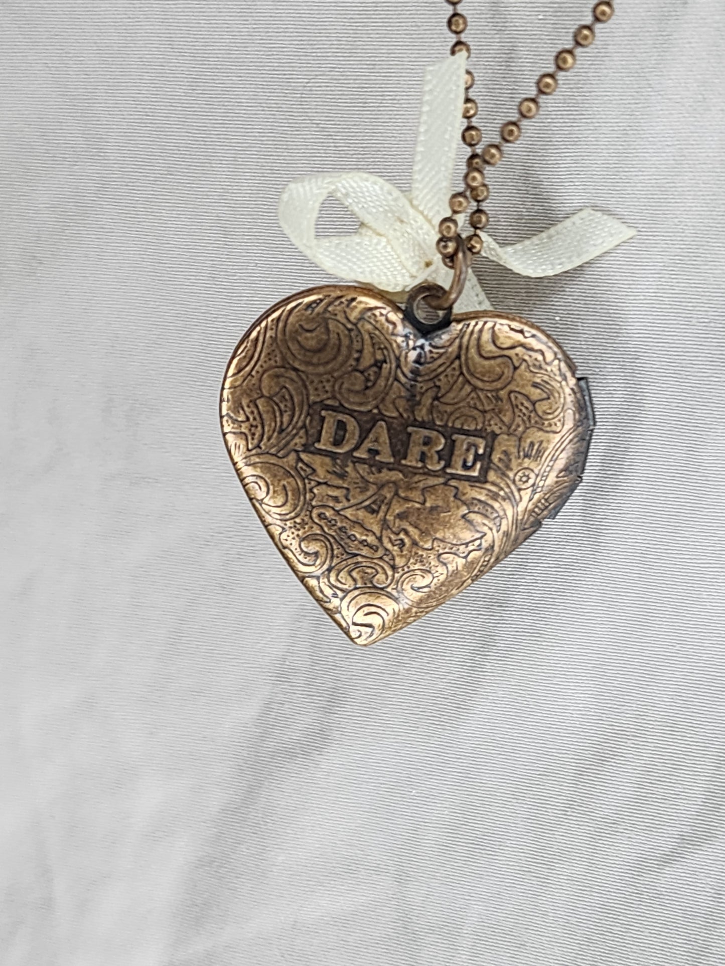 Truth or Dare Brass Photo Locket (1 inch high)