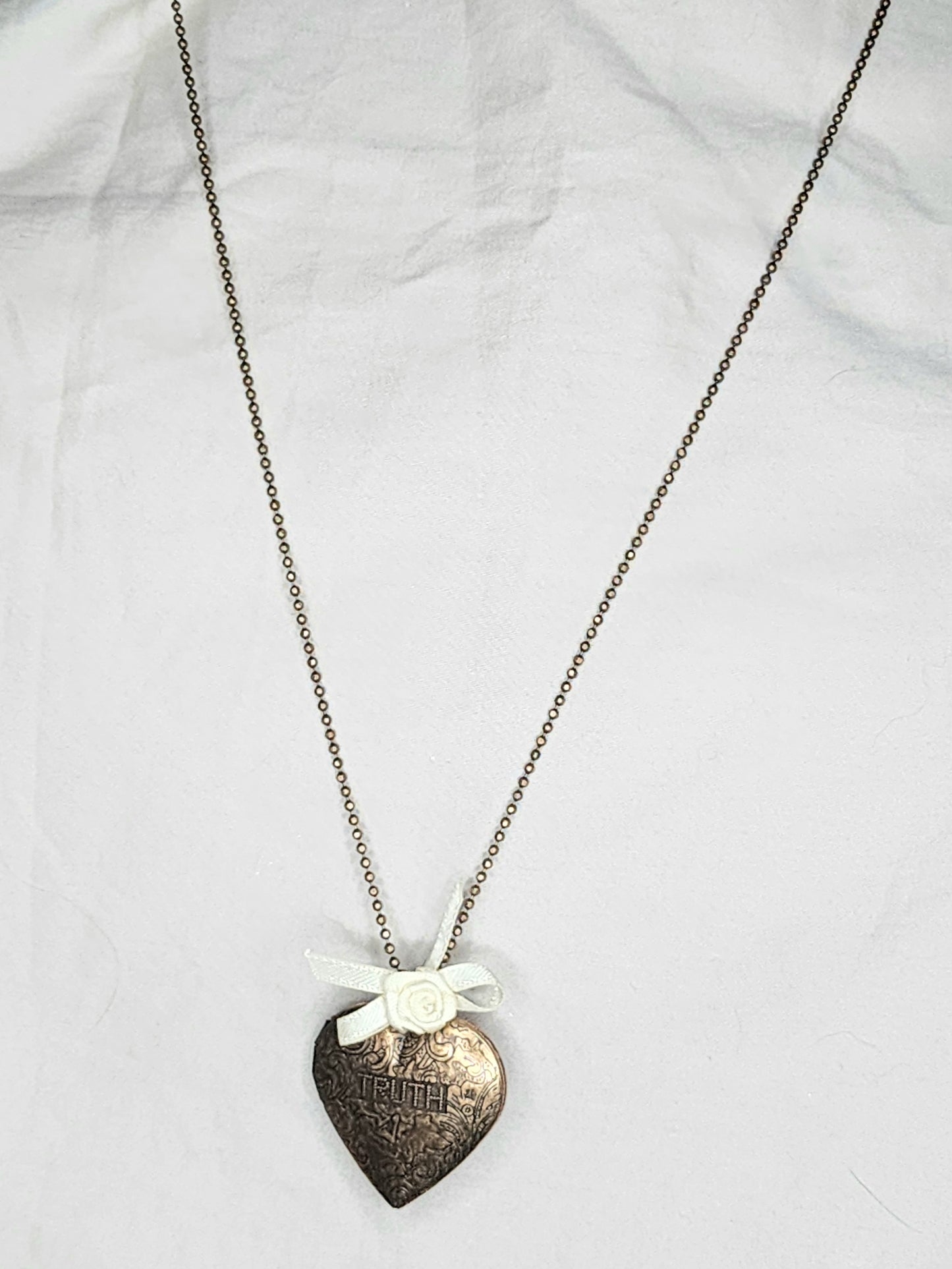 Truth or Dare Brass Photo Locket (1 inch high)